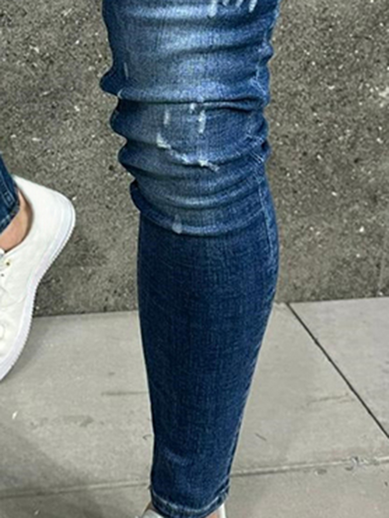 Blue skinny distressed jeans