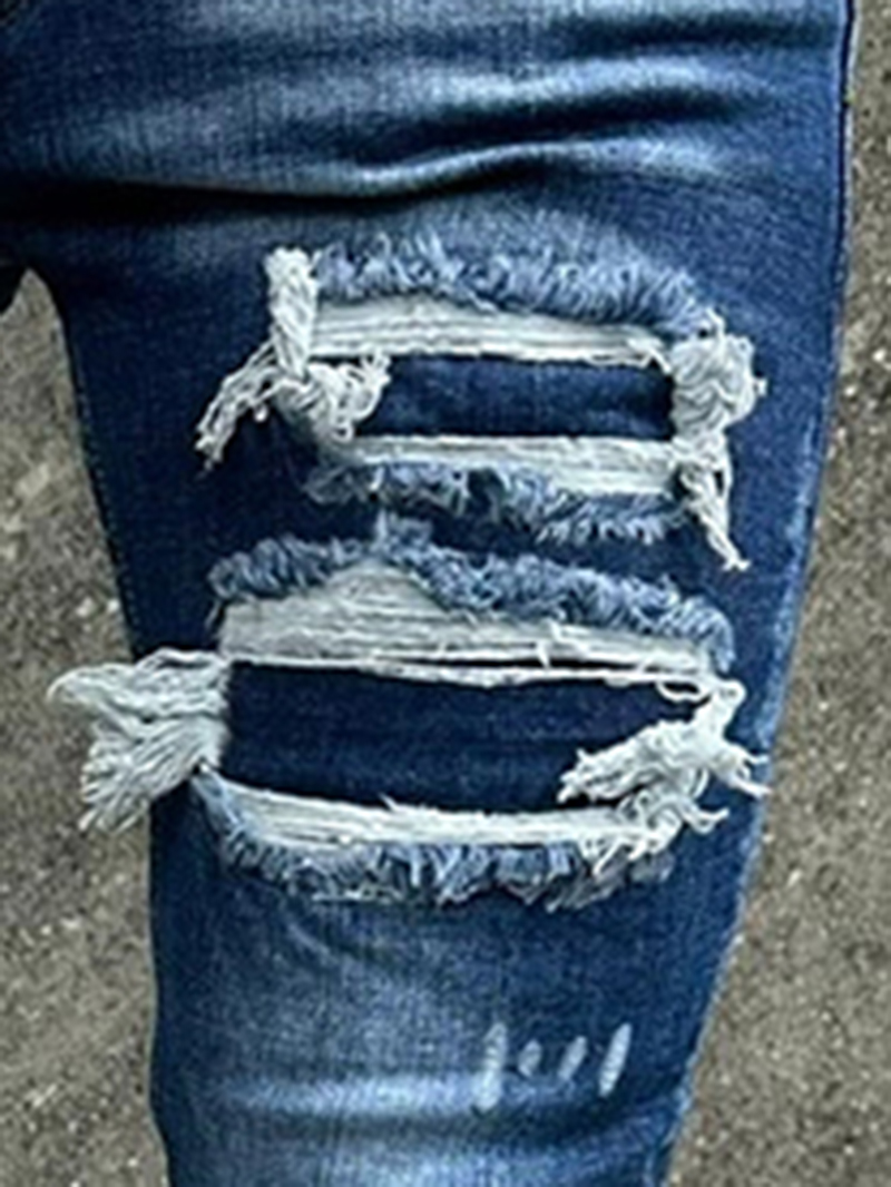 Blue skinny distressed jeans