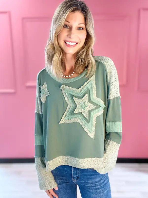 A Star Is Born Star Patch Long Sleeve Cropped Knit Top - A