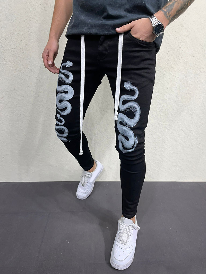 Men's snake patterned skinny jeans