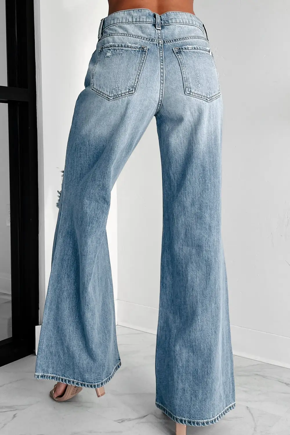 Kyra High Rise Distressed Wide Leg Sneak Peek Jeans