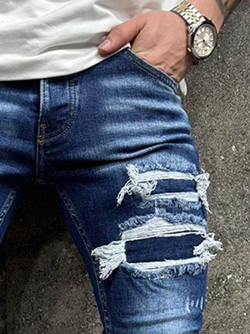 Blue skinny distressed jeans