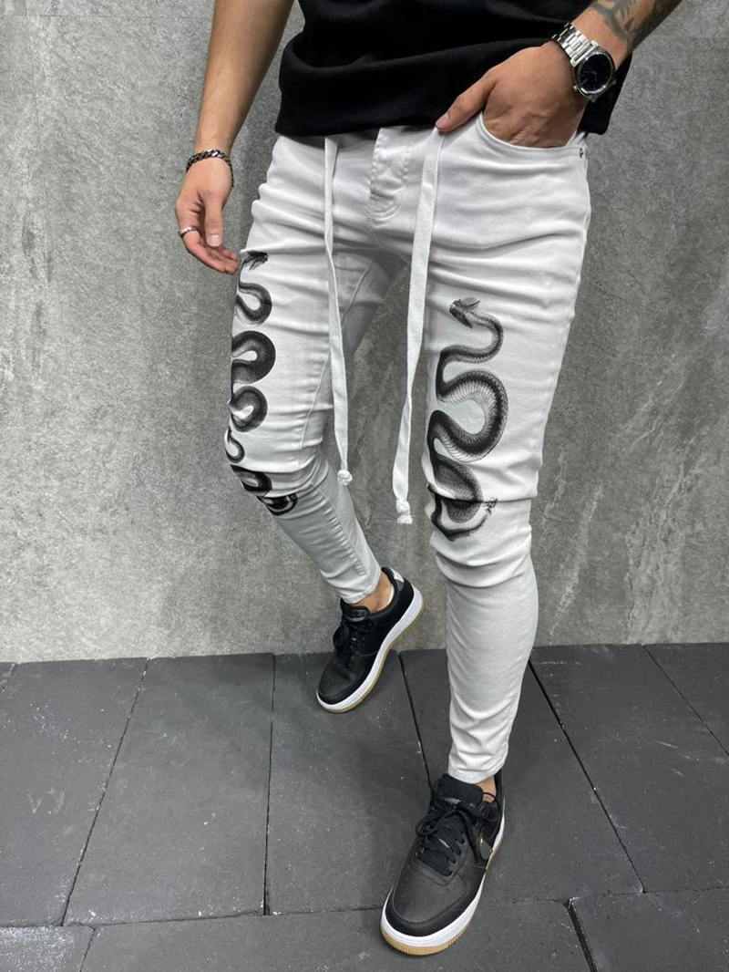 Men's snake patterned skinny jeans