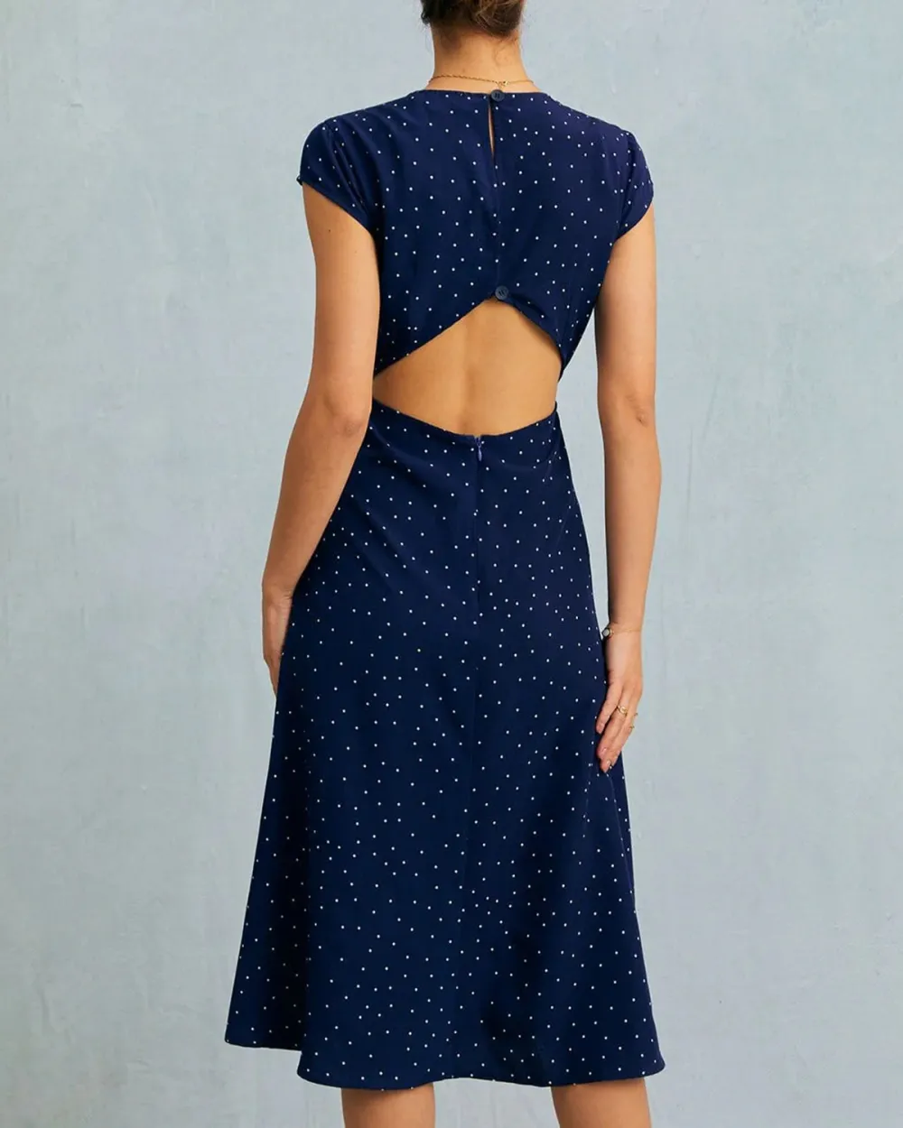 Navy blue dress with hollowed-out back