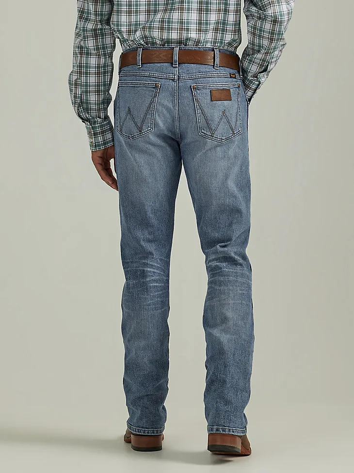 THE WRANGLER RETRO® PREMIUM JEAN: MEN'S SLIM BOOT IN WILD WEST