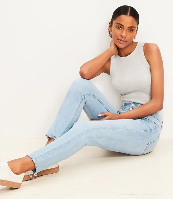 Destructed Button Front High Rise Skinny Jeans in Light Wash