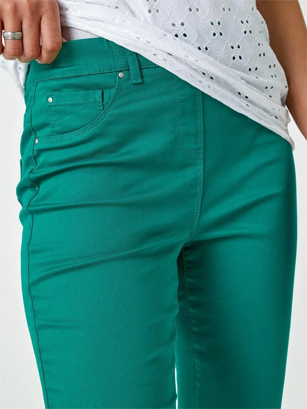 Green skinny trousers