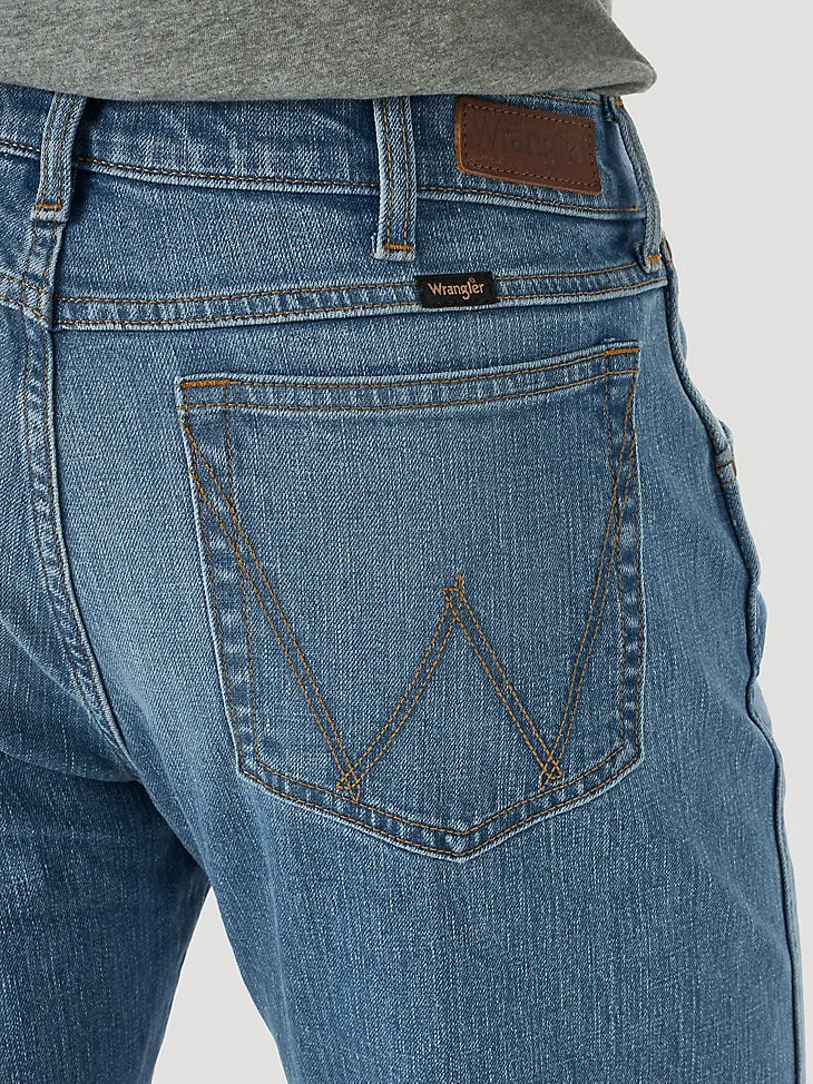 MEN'S WRANGLER® SLIM STRAIGHT JEAN IN ACID WASH