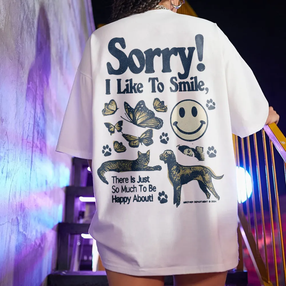 sorry i like to smile there is just so much to be happy about Women's T-shirt