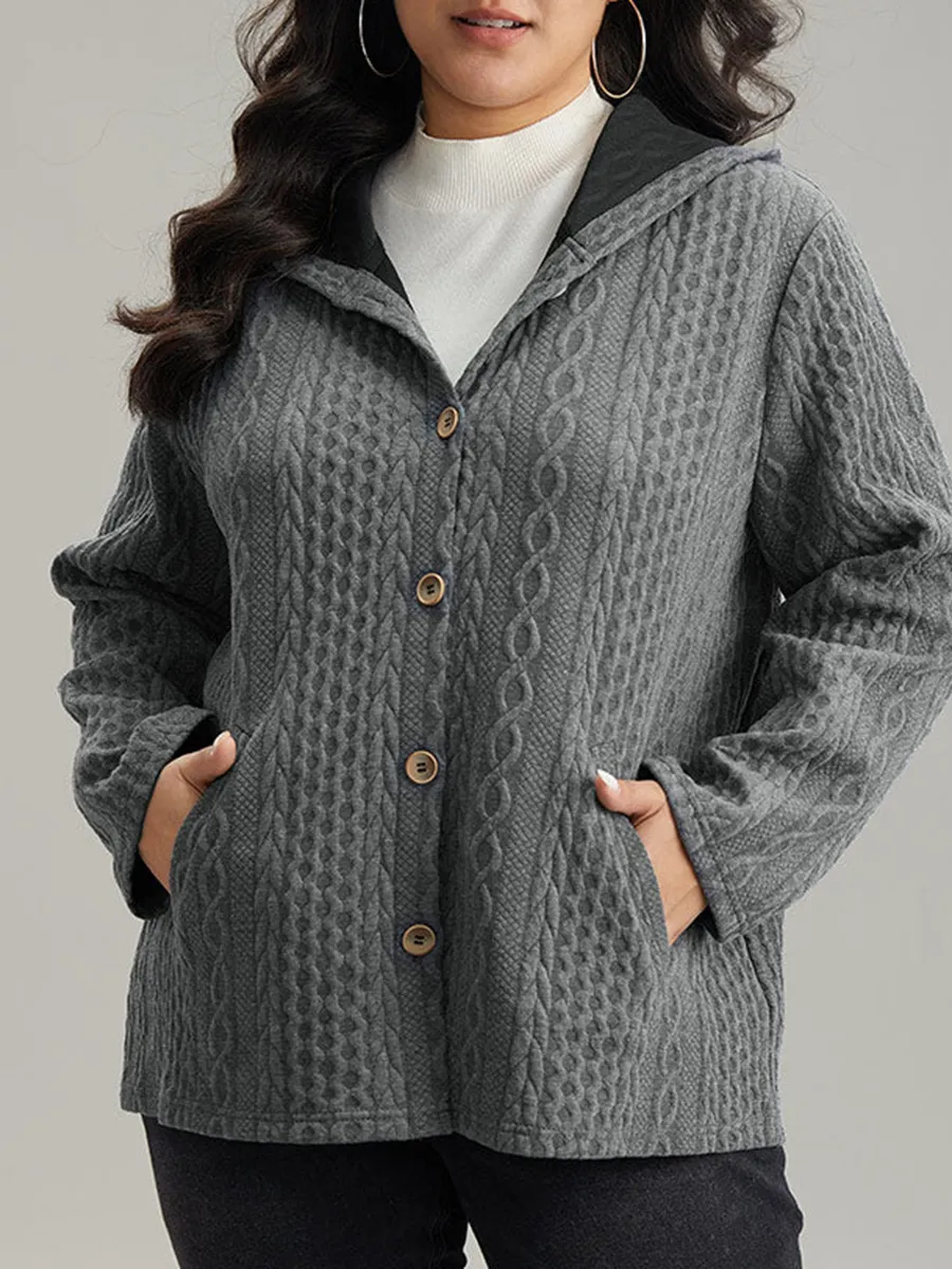 The gray textured jacket has pockets