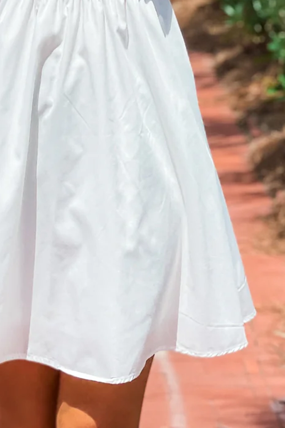 Short dress with bow tie at back