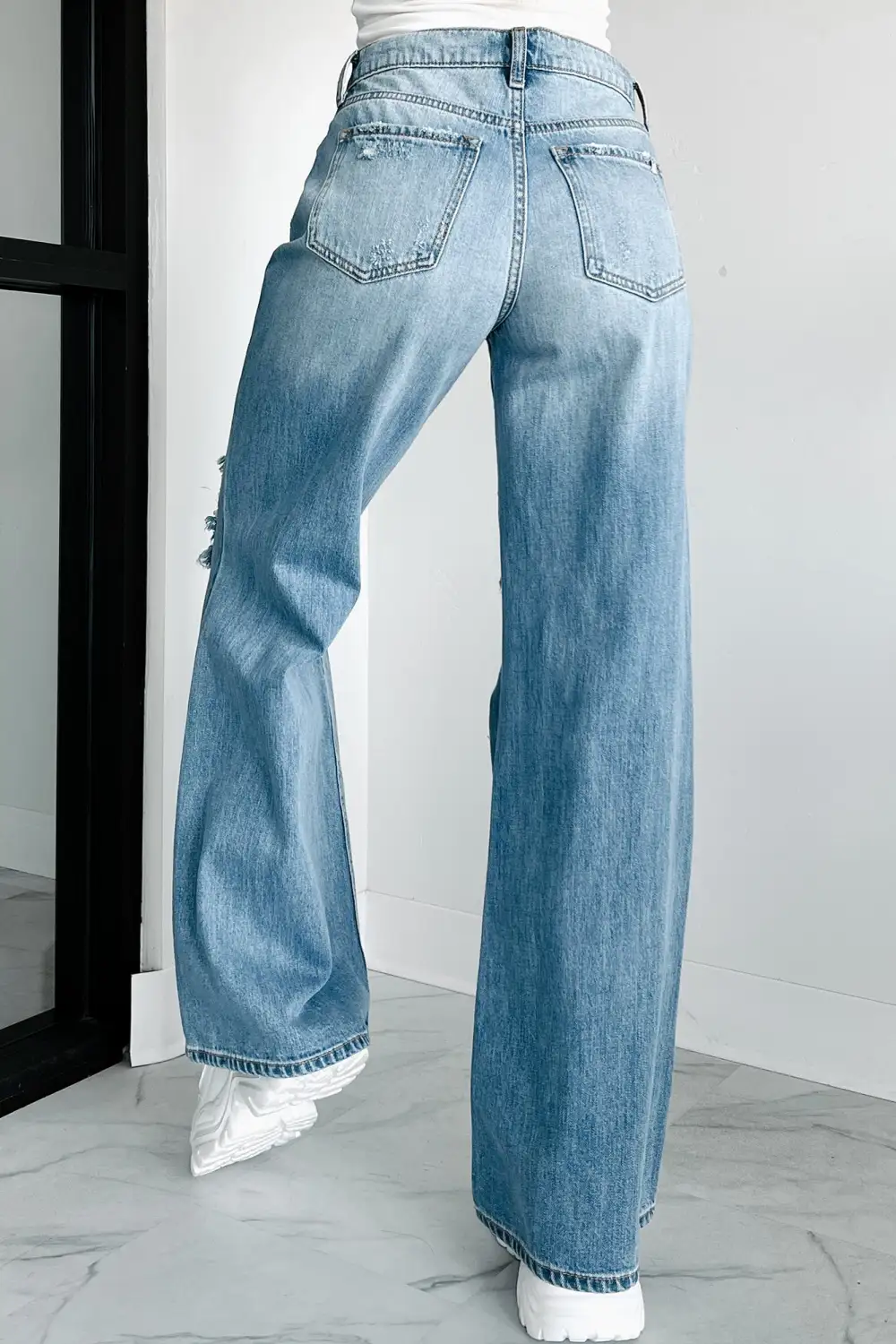 Kyra High Rise Distressed Wide Leg Sneak Peek Jeans