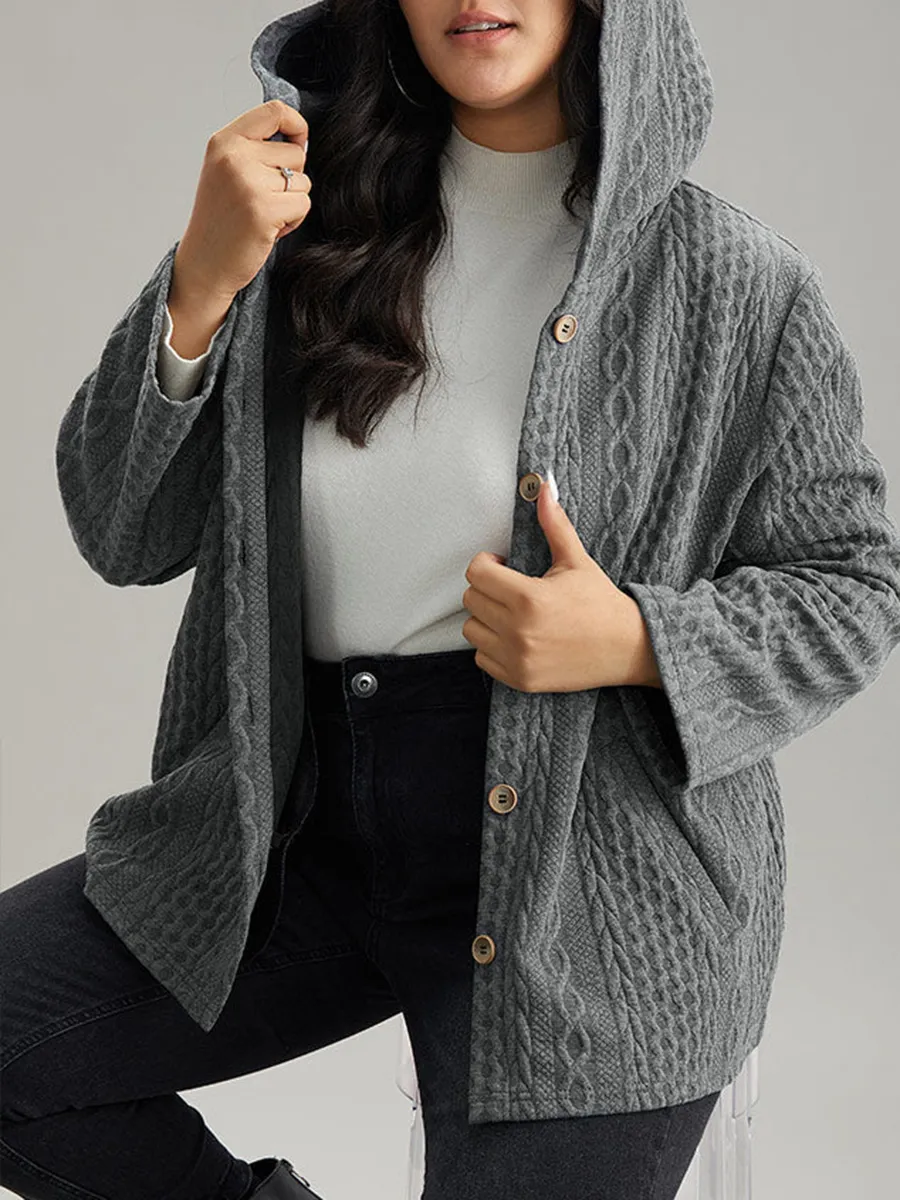 The gray textured jacket has pockets