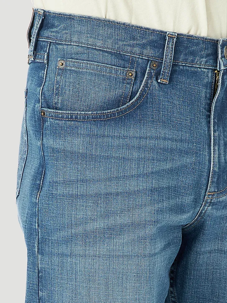 MEN'S RELAXED FIT FLEX JEAN IN MID DENIM